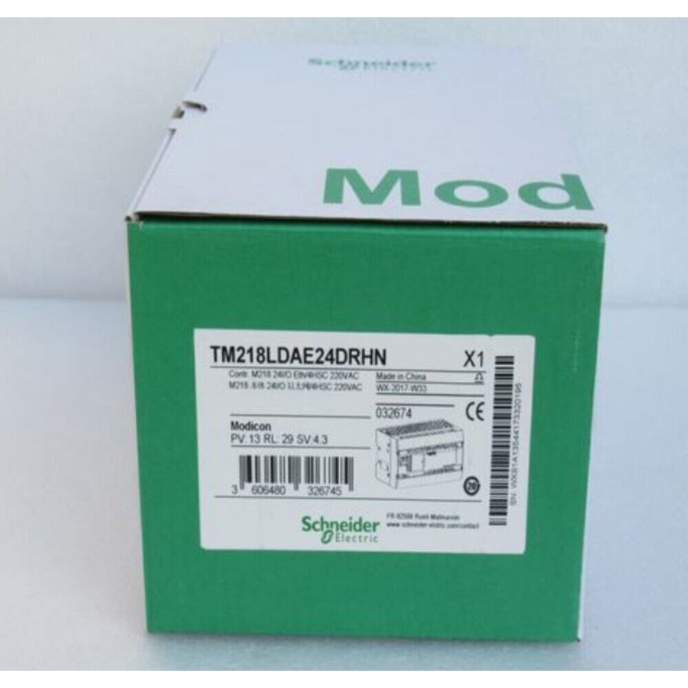 Schneider Electric TM218LDAE24DRHN PLC module box, green and white packaging, Modicon
