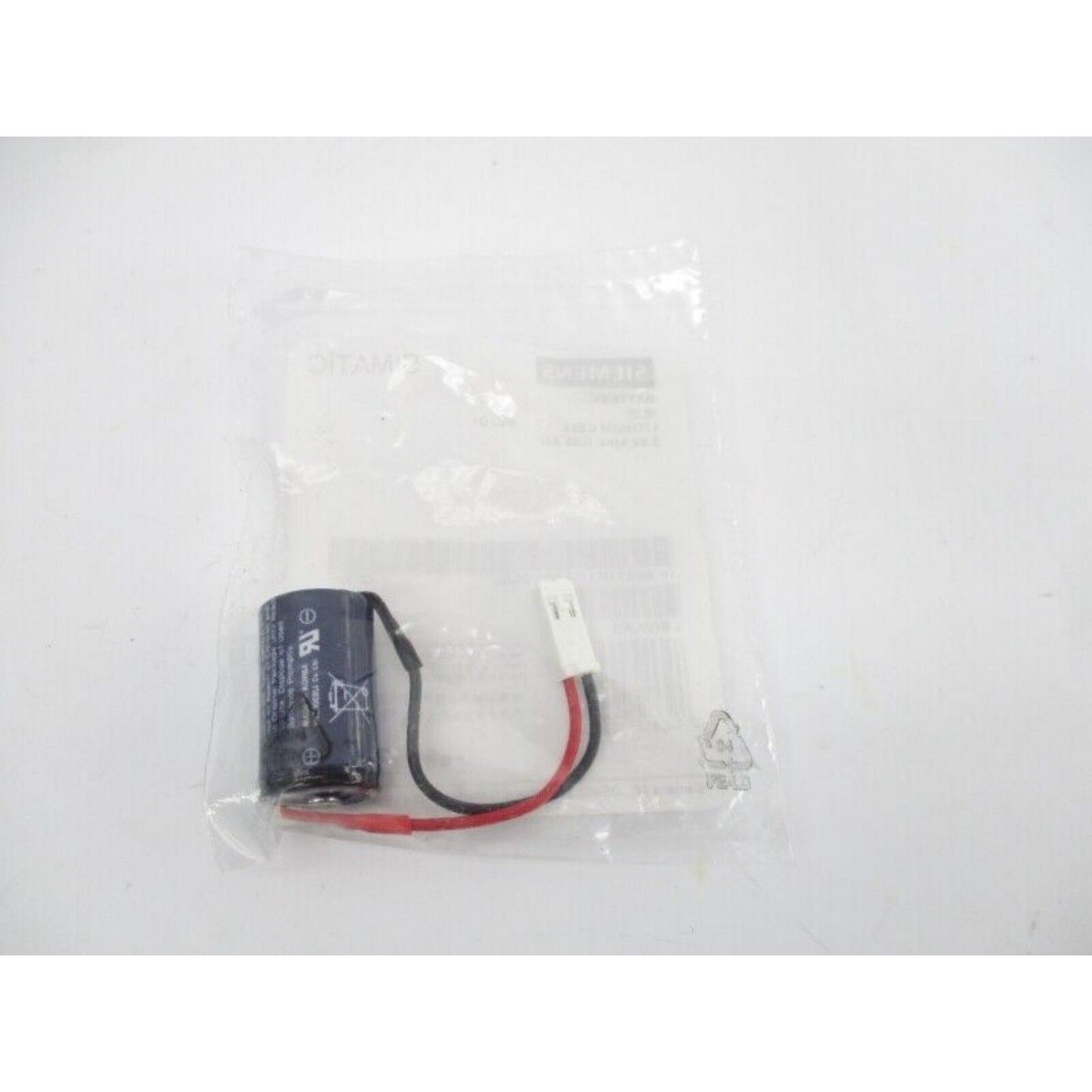 Siemens SIMATIC S7 backup battery 6ES7971-1AA00-0AA0 with connector and packaging.