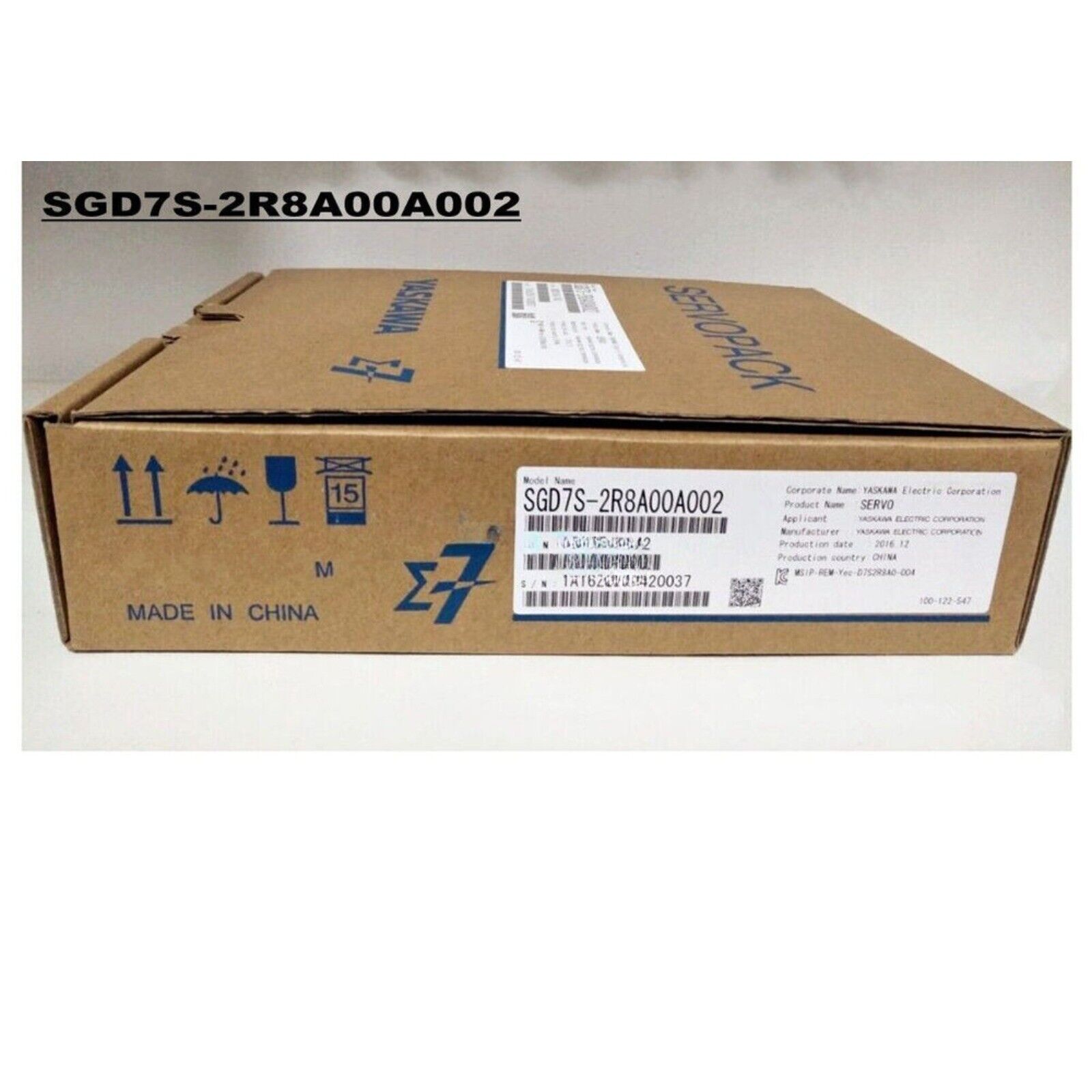 Yaskawa SGD7S-2R8A00A002 Servo Drive in a cardboard box, featuring product details and "SERVO" label.