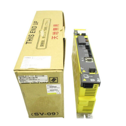 FANUC A06B-6114-H103 screen, yellow and gray, in original box, labeled 'THIS END UP' and '天地無用'.