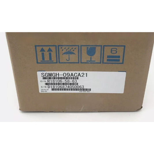 YASKAWA AC servo motor SGMGH-09ACA21 in a brown cardboard box, labeled with product information and handling symbols