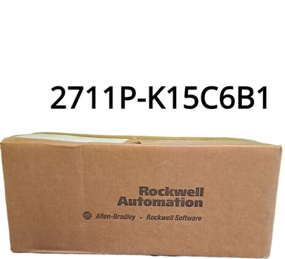 Allen-Bradley 2711P-K15C6B1 in a cardboard box. Rockwell Automation logo and product model number are visible.
