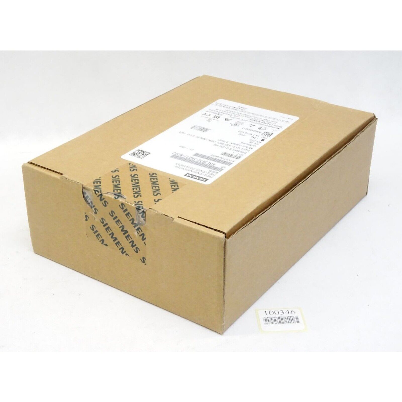 Siemens SINAMICS G120C frequency inverter in a brown cardboard box, product packaging.