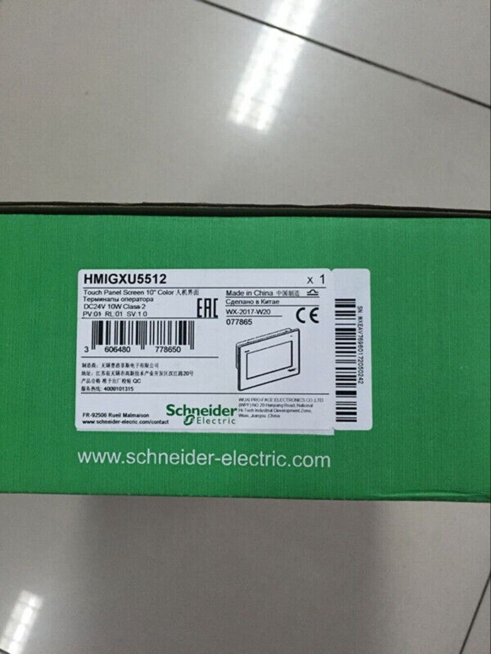 Schneider Electric HMIGXU5512 HMI panel box, product label, 10-inch color touchscreen.