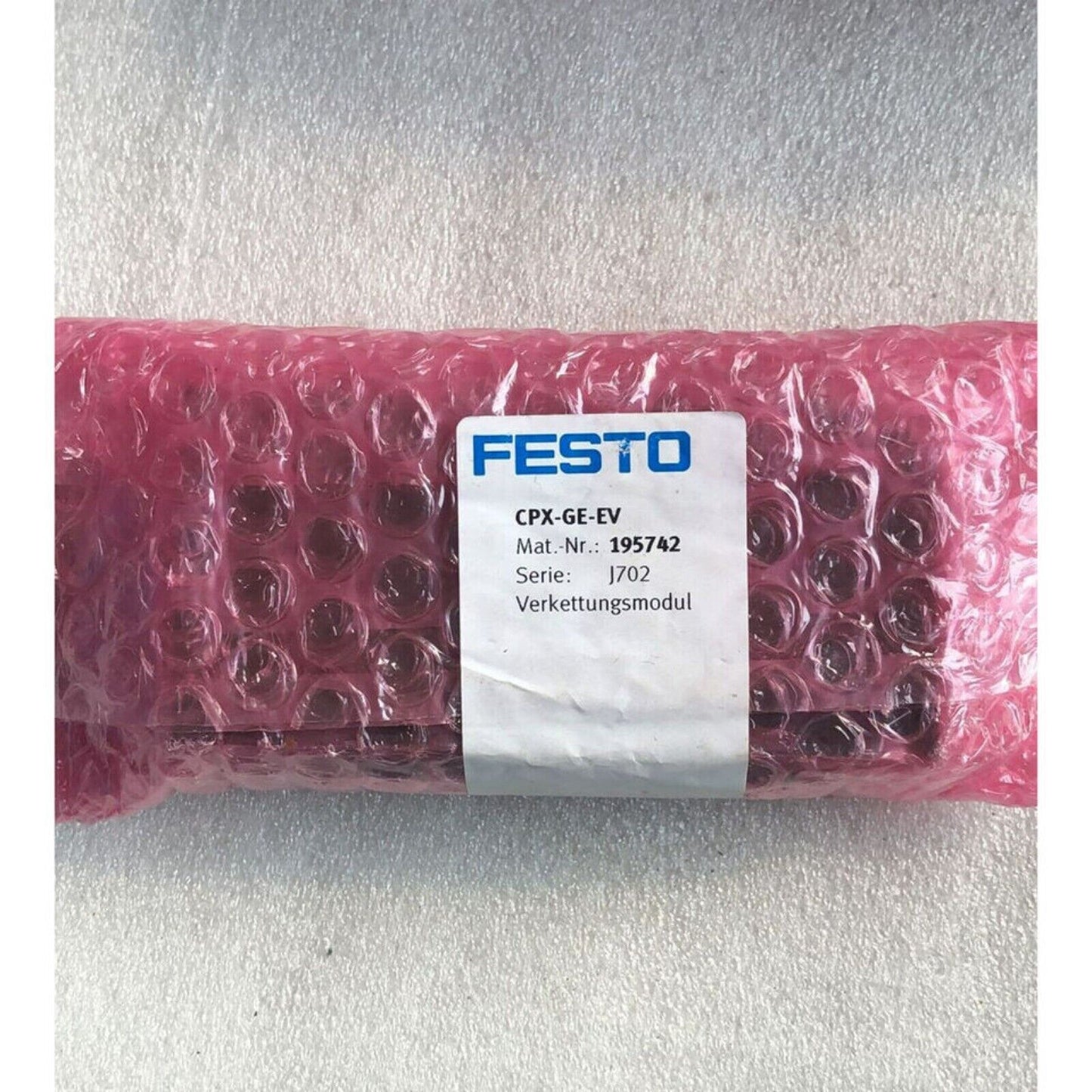Festo CPX-GE-EV 195742 interlinking module in protective packaging. Industrial automation part.