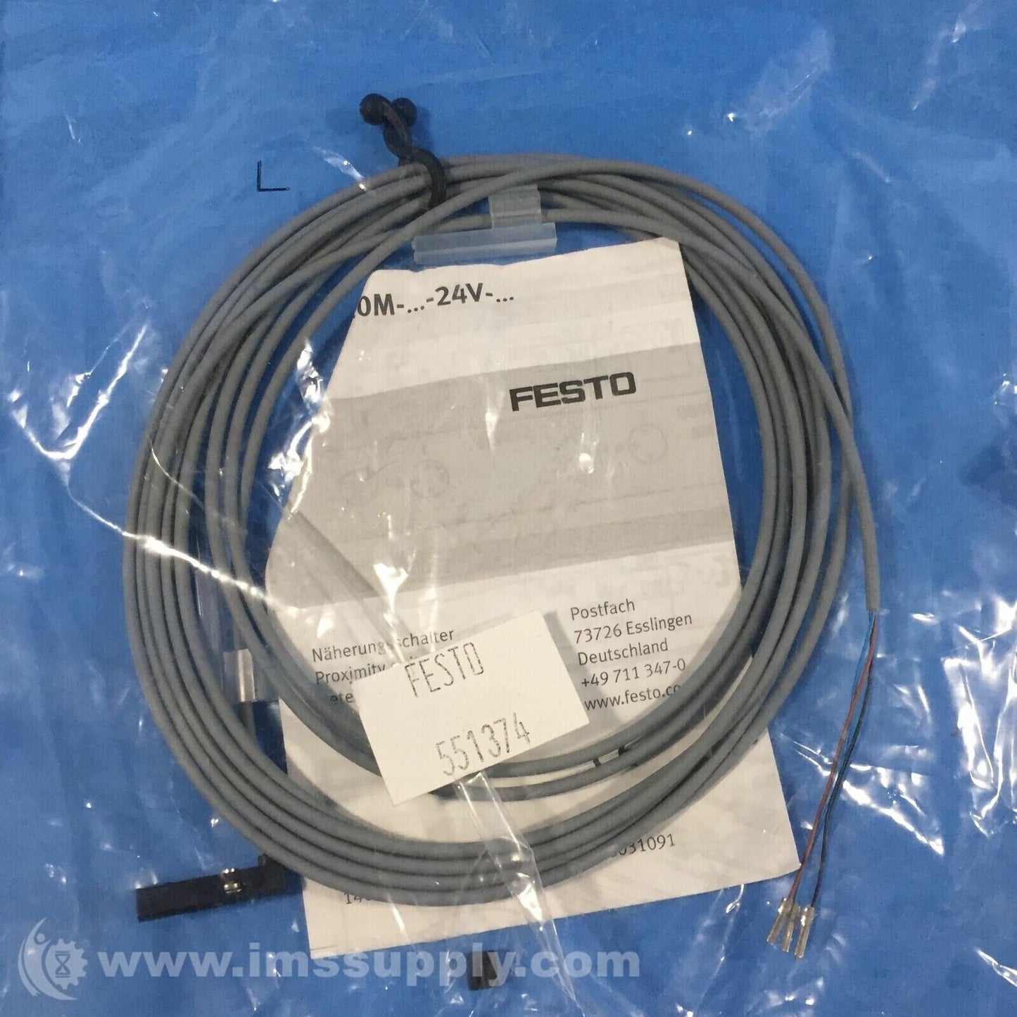 Festo SMT-10M-PS-24V-E-2,5-Q-OE 551374 proximity sensor with gray cable.