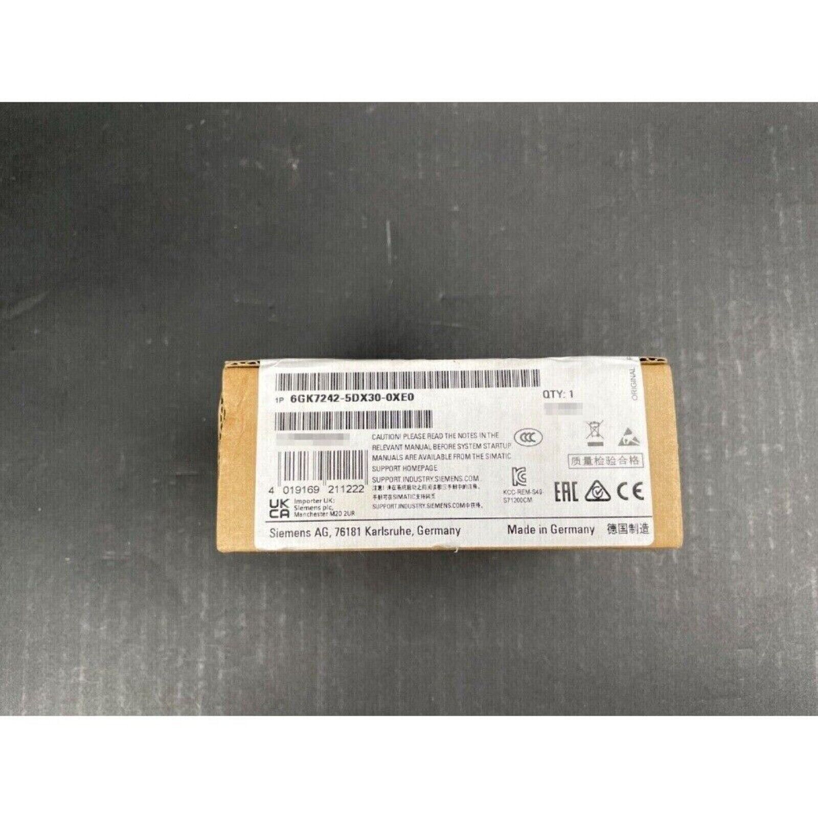 Siemens 6GK7242-5DX30-0XE0 PLC module packaging, made in Germany, featuring product information and quality control labels.