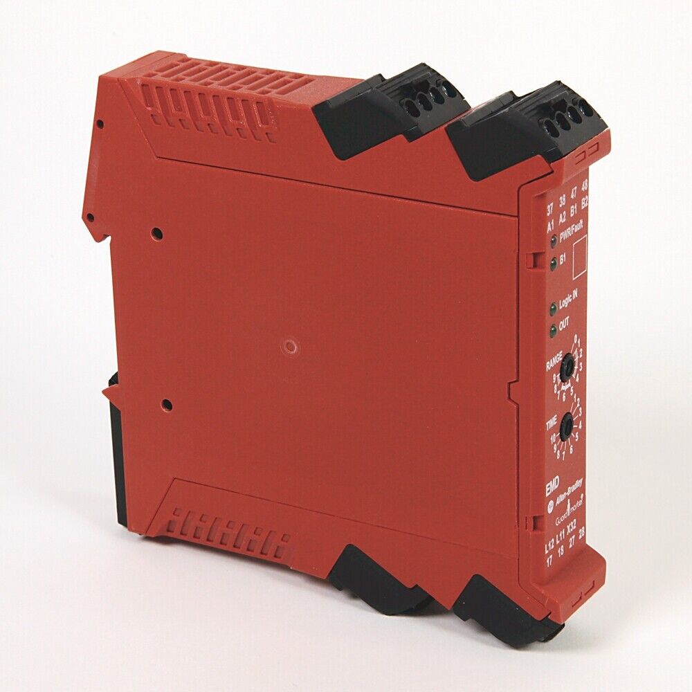 Allen-Bradley 440R-EM4R2D Guardmaster Safety Relay in red, with black components, showing inputs, outputs and time settings