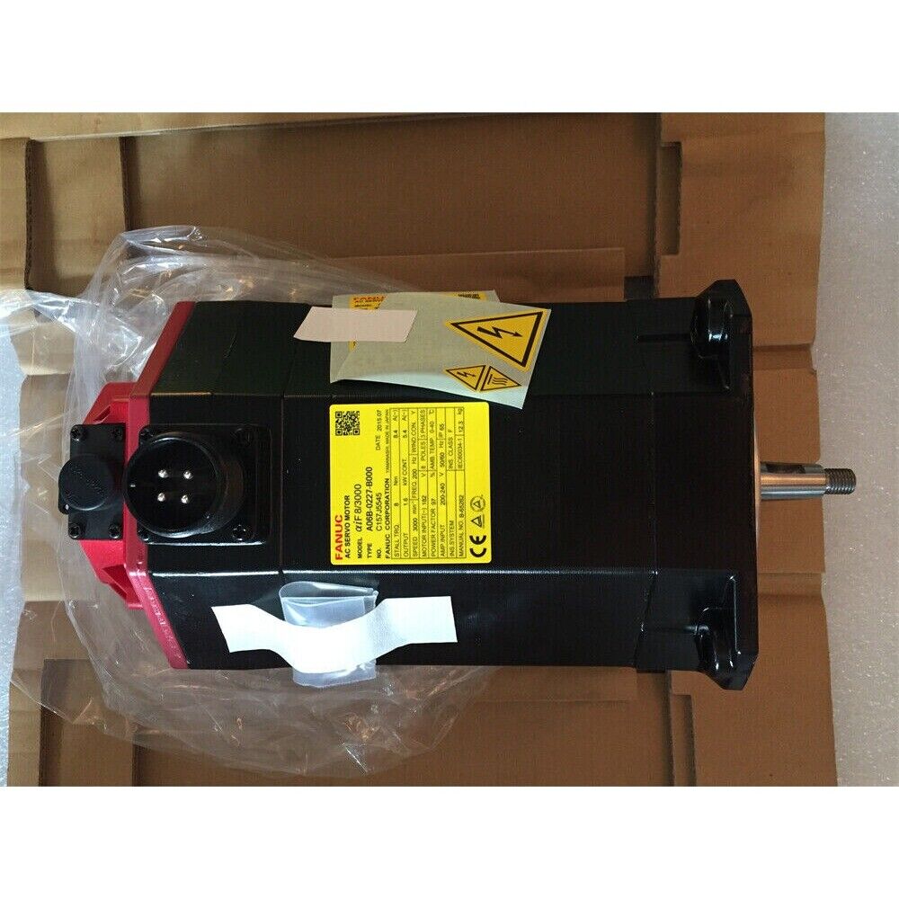 FANUC A06B-0227-B000 Servo Motor, new in box, black and red industrial automation part.