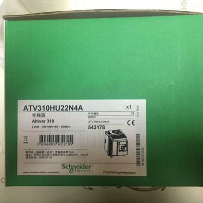 Schneider Electric ATV310HU22N4A variable frequency drive on green box, new in box.