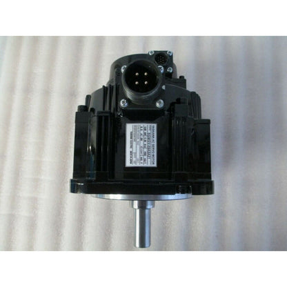 YASKAWA SGMGV-09A3A21 AC Servo Motor, black industrial equipment, front view, MADE IN JAPAN.