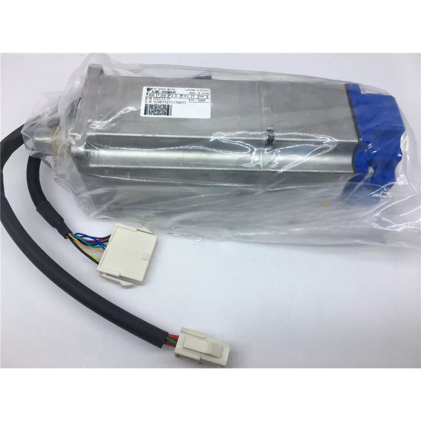 YASKAWA SJME-04AMA4C Servo Motor, new industrial automation part, with label details, packaged for shipping.
