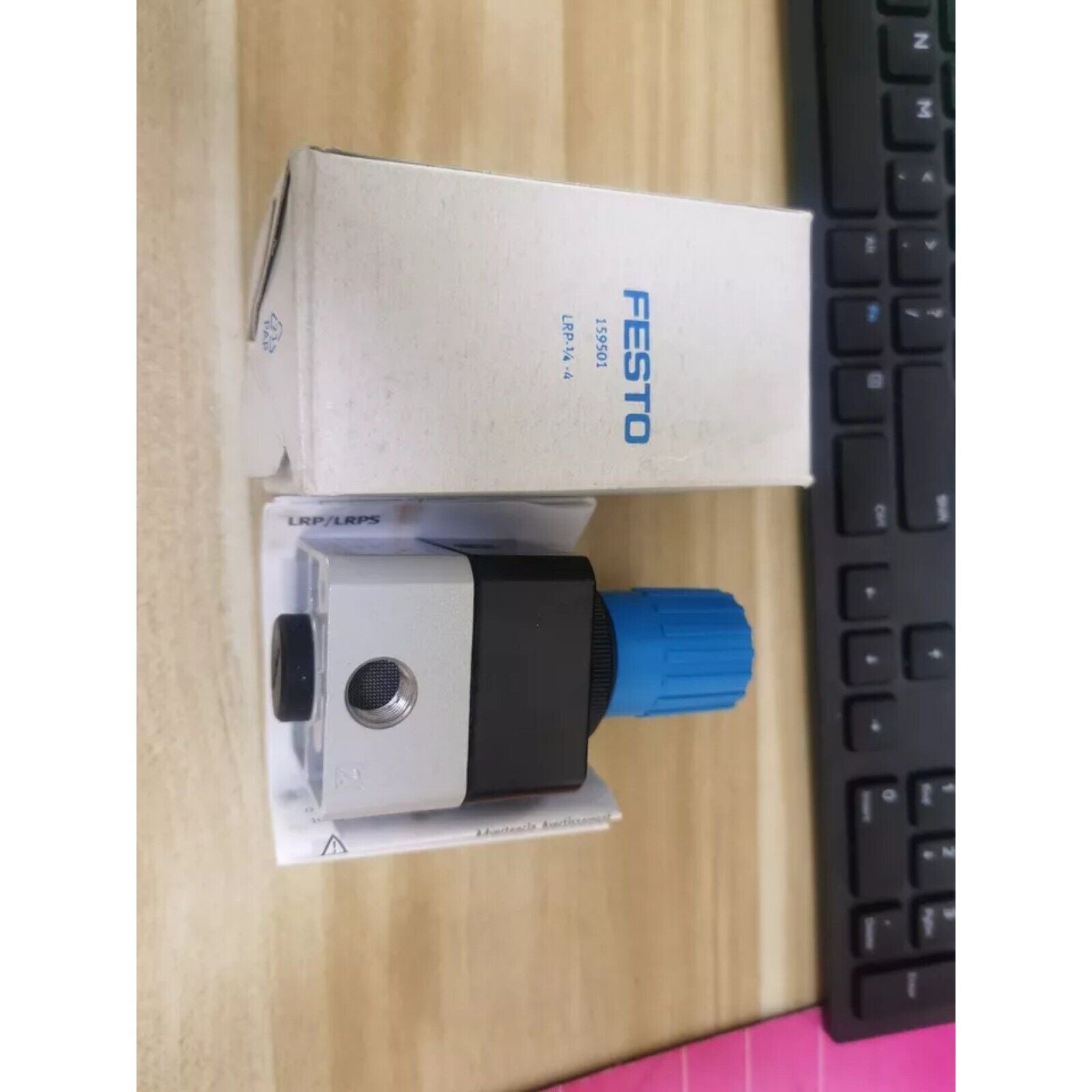 Festo LRP-1/4-4 precision pressure regulator with blue dial, industrial automation part.