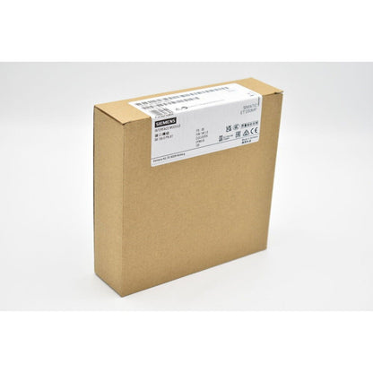 Siemens SIMATIC ET 200MP interface module box. Features product labels, ideal for industrial automation applications.