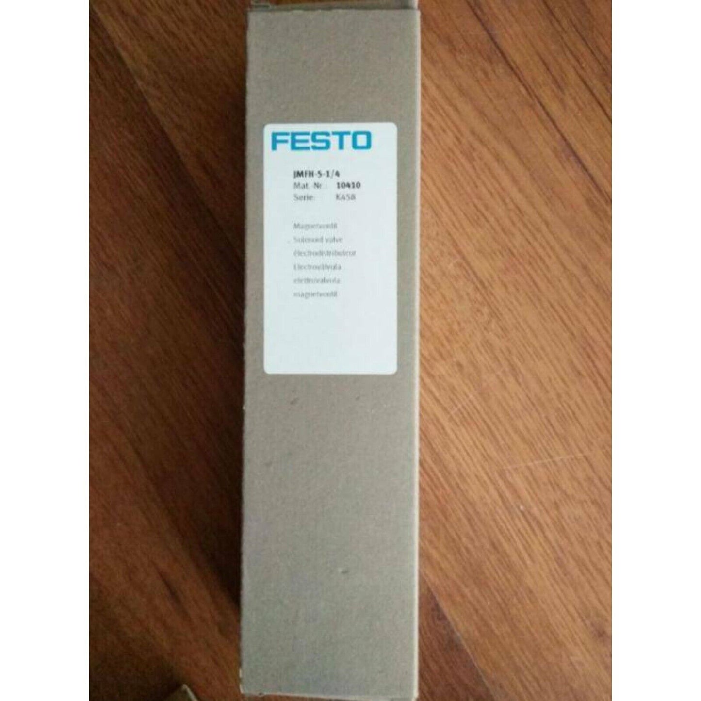 Festo JMFH-5-1/4 solenoid valve in box. Industrial automation part, electrical equipment.
