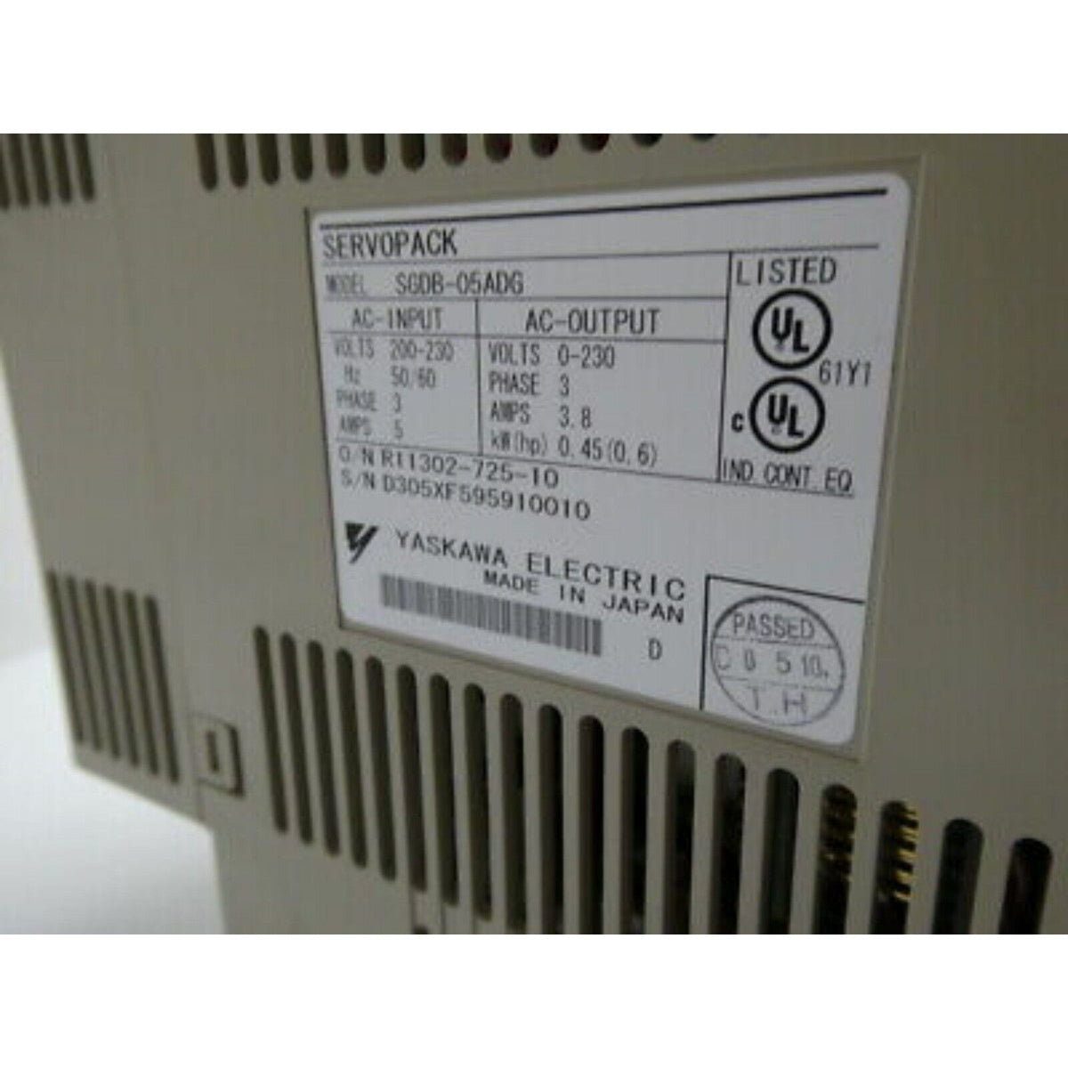 YASKAWA SGDB-05ADG Servopack, label showing AC input and output details, Made in Japan. Industrial automation part.