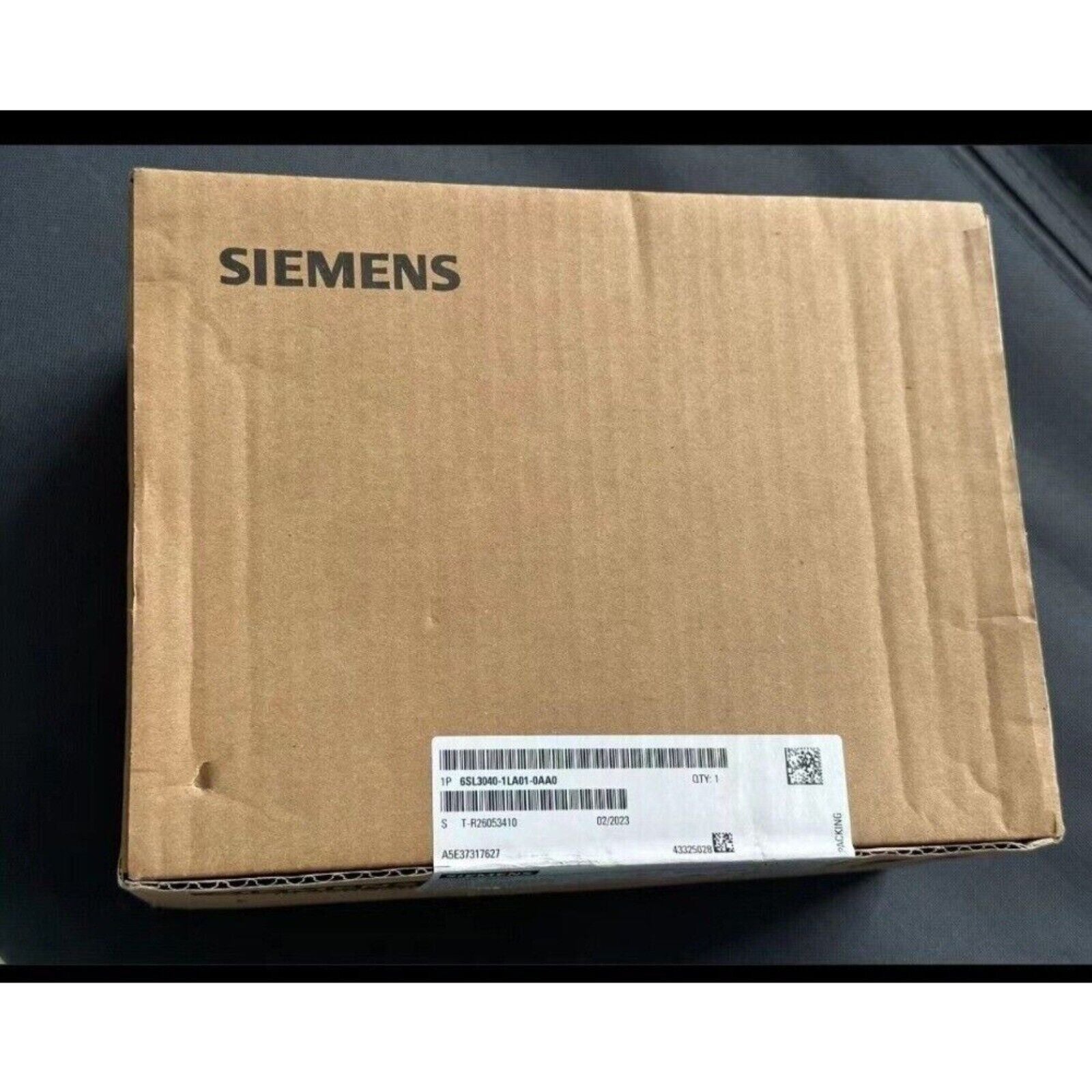 Siemens SINAMICS G120 frequency converter box, part number 6SL3040-1LA01-0AA0, brown cardboard packaging