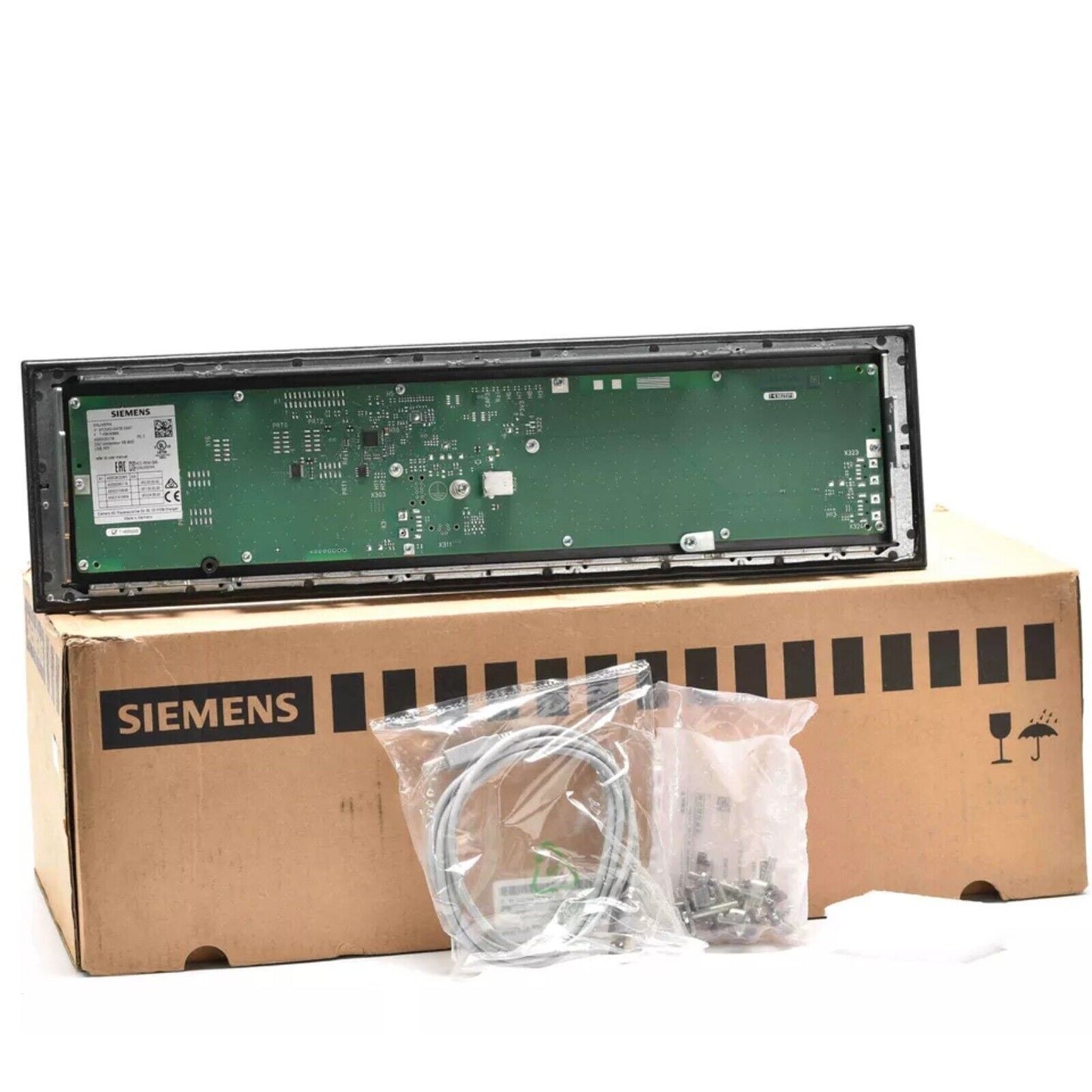 Siemens SINAMICS S120/SINUMERIK CNC system component, with a green circuit board and black frame, inside a SIEMENS box.