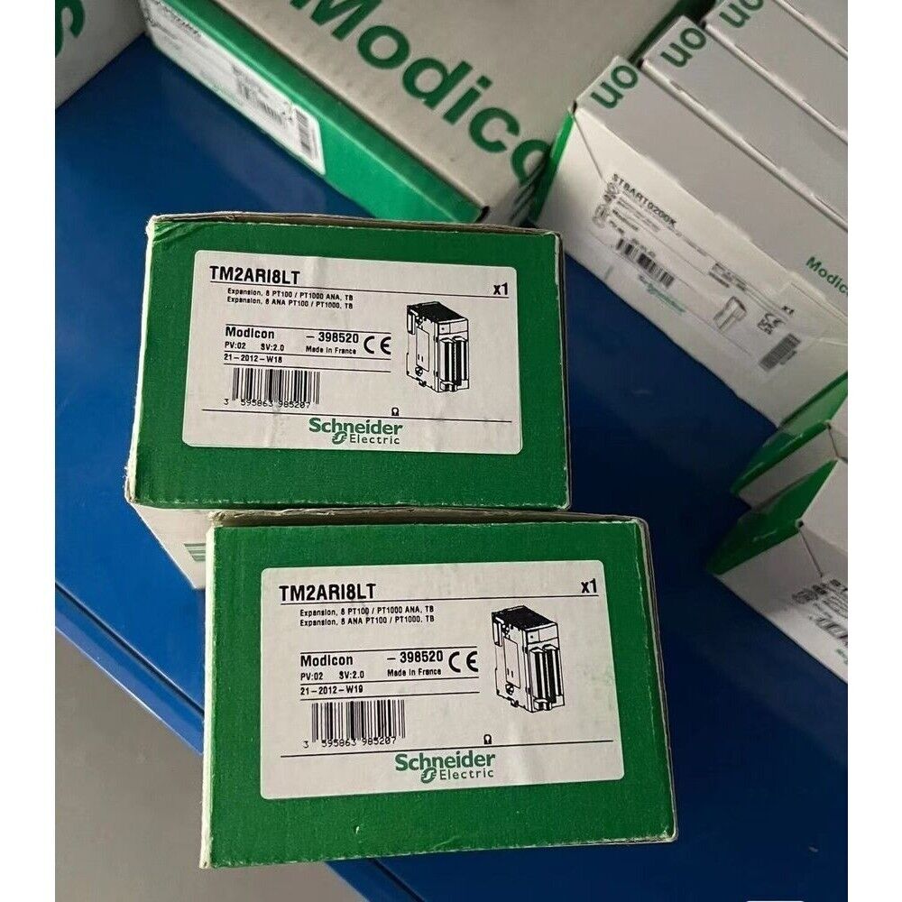 Schneider Electric TM2ARI8LT PLC module product box, industrial automation part, green and white