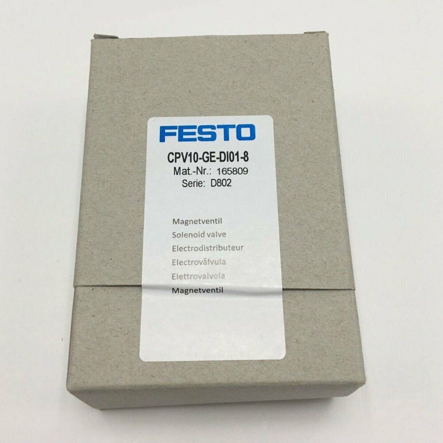 FESTO CPV10-GE-DI01-8 solenoid valve in a gray box, featuring model details for industrial automation.
