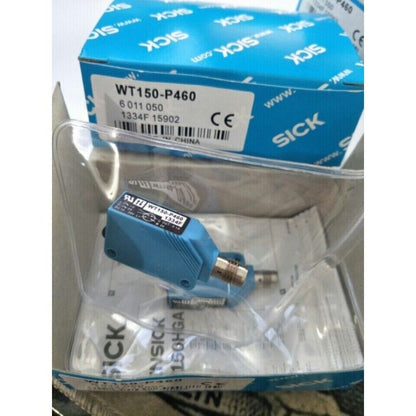 SICK WT150-P460 Photoelectric Sensor, blue industrial automation part in packaging, featuring product details and CE mark.