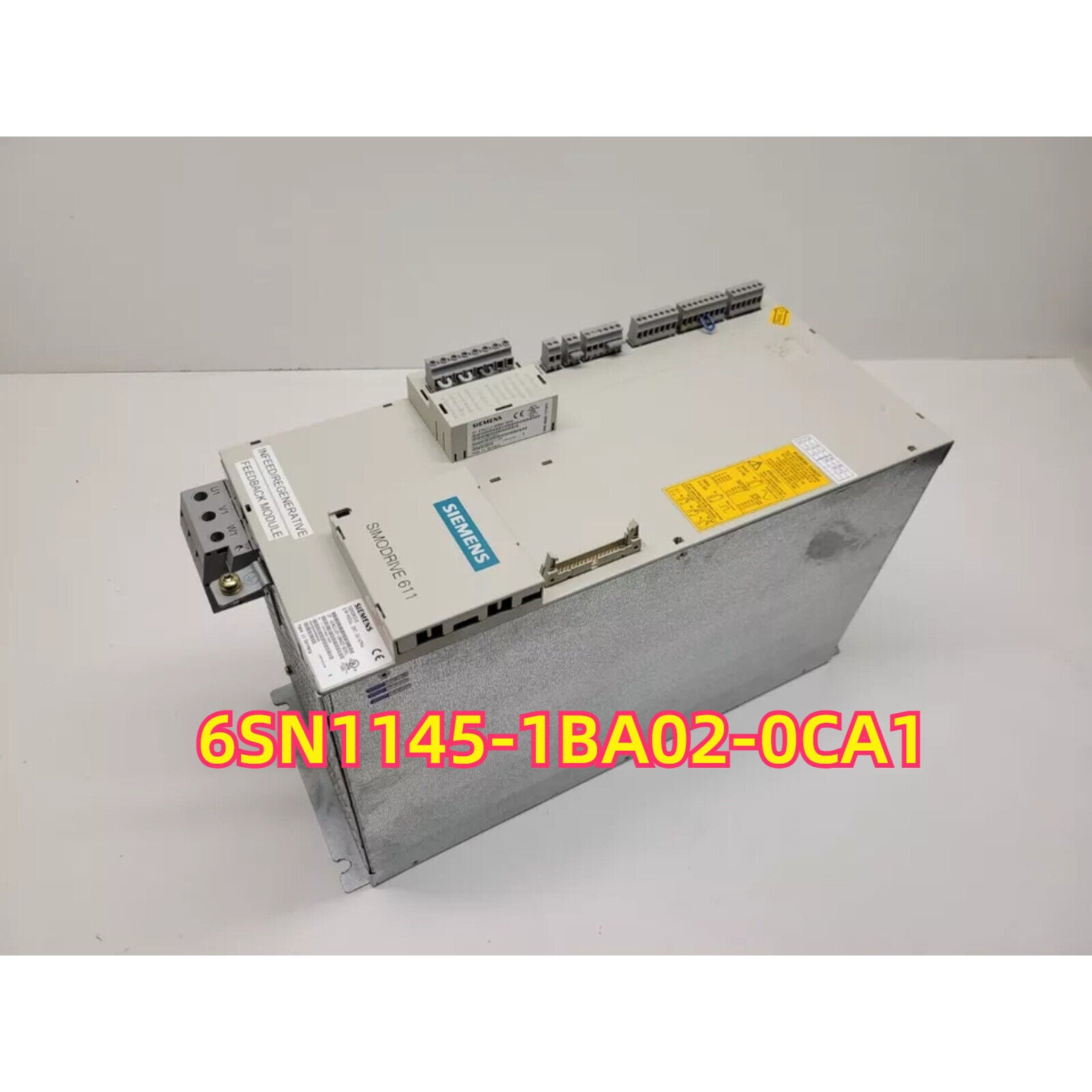 Siemens SIMODRIVE 611 Module 6SN1145-1BA02-0CA1, industrial automation part, gray metal casing with electronic components.