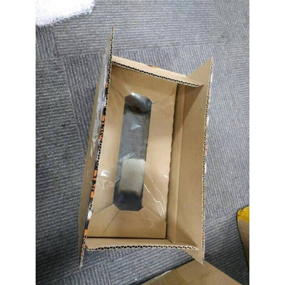 B&R X20CP1485-1 PLC controller module packaging, cardboard box with transparent window, ready for shipping