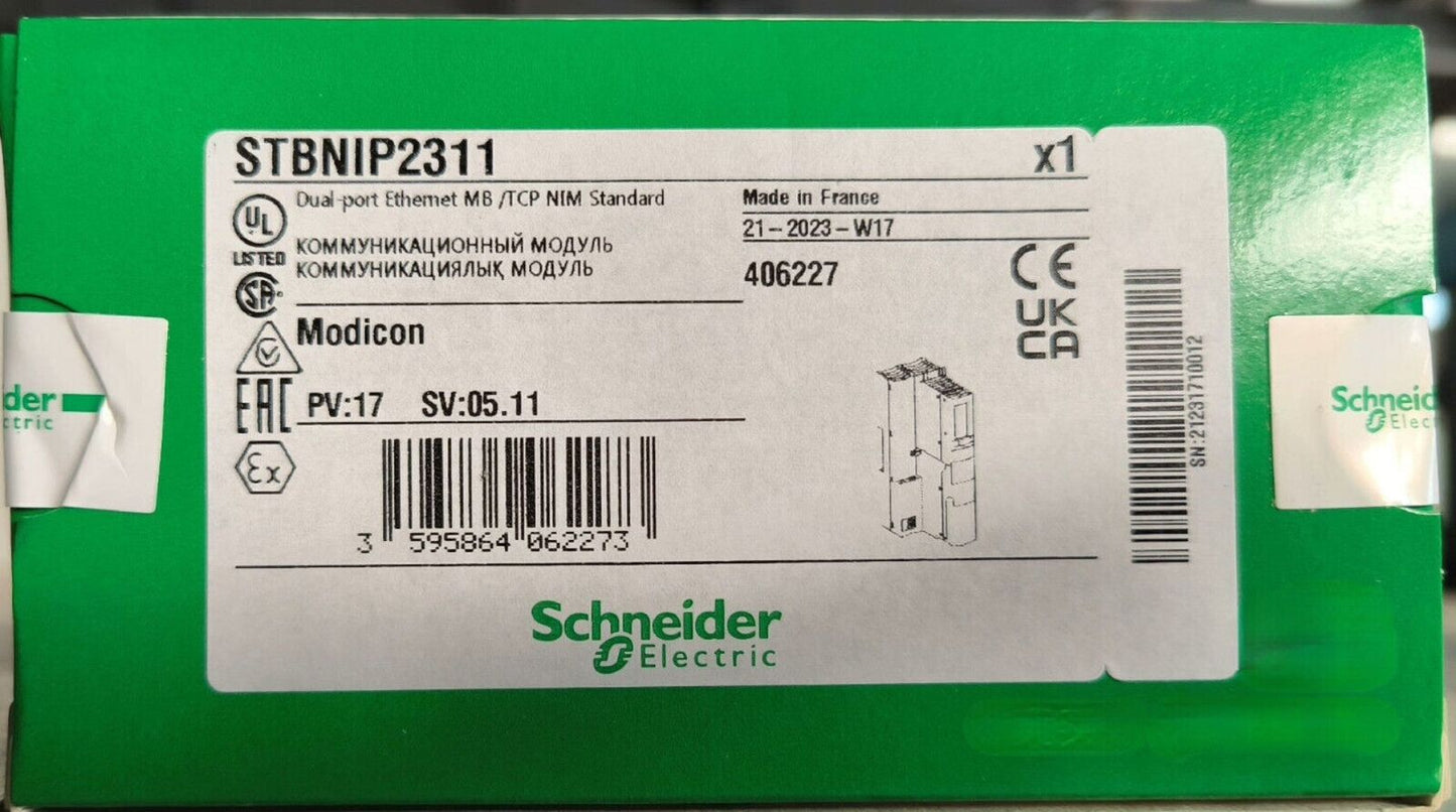 Schneider Electric STBNIP2311 PLC Module, industrial automation I/O, Made in France, Modicon.