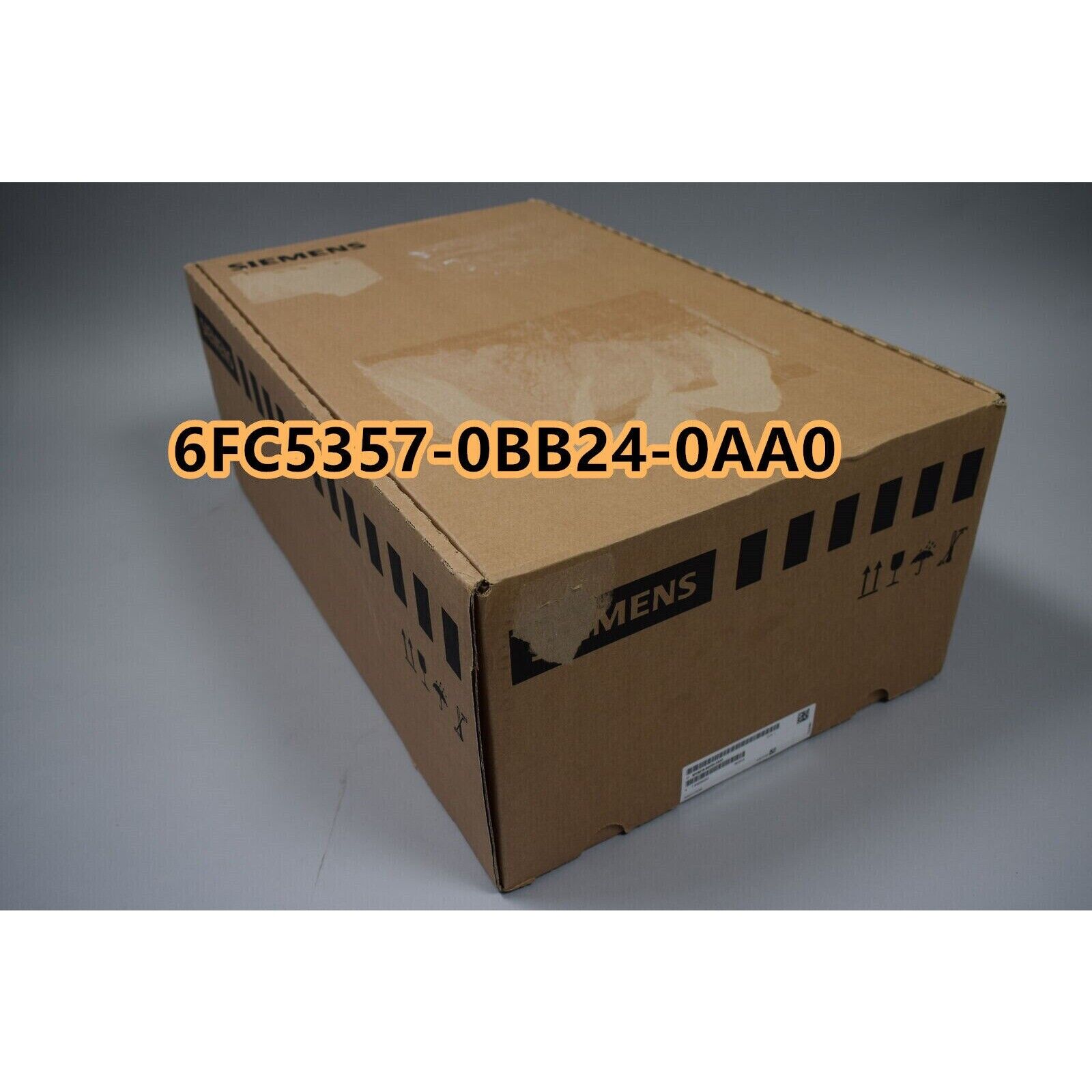Siemens 6FC5357-0BB24-0AA0 PLC product box, brown cardboard with product details.
