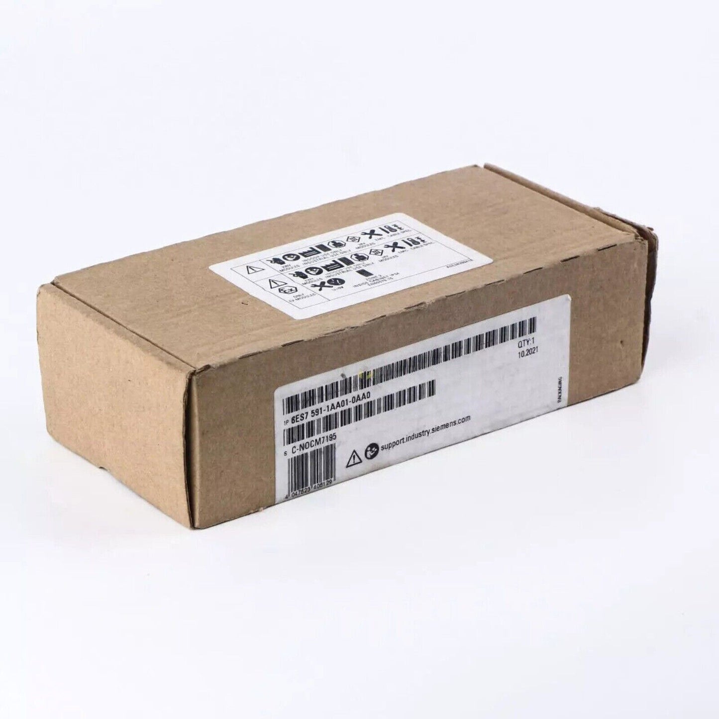 Siemens S7-1500 spare part packaging. Brown cardboard box with labels and barcode, including part number 6ES7 591-1AA01-0AA0