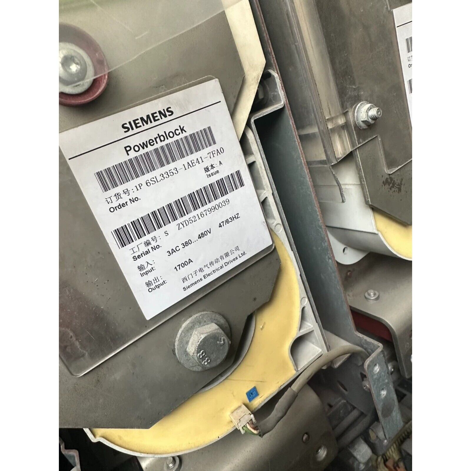 Siemens Powerblock 6SL3353-1AE41-7FA0 PLC component with labels and serial number details, electrical equipment