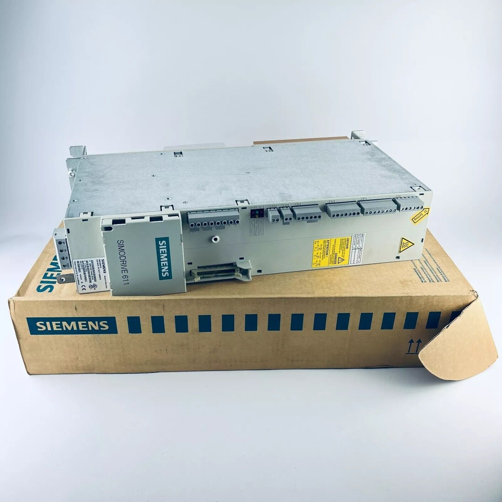 Siemens SIMODRIVE 611 Power Module on its original packaging, industrial automation part.