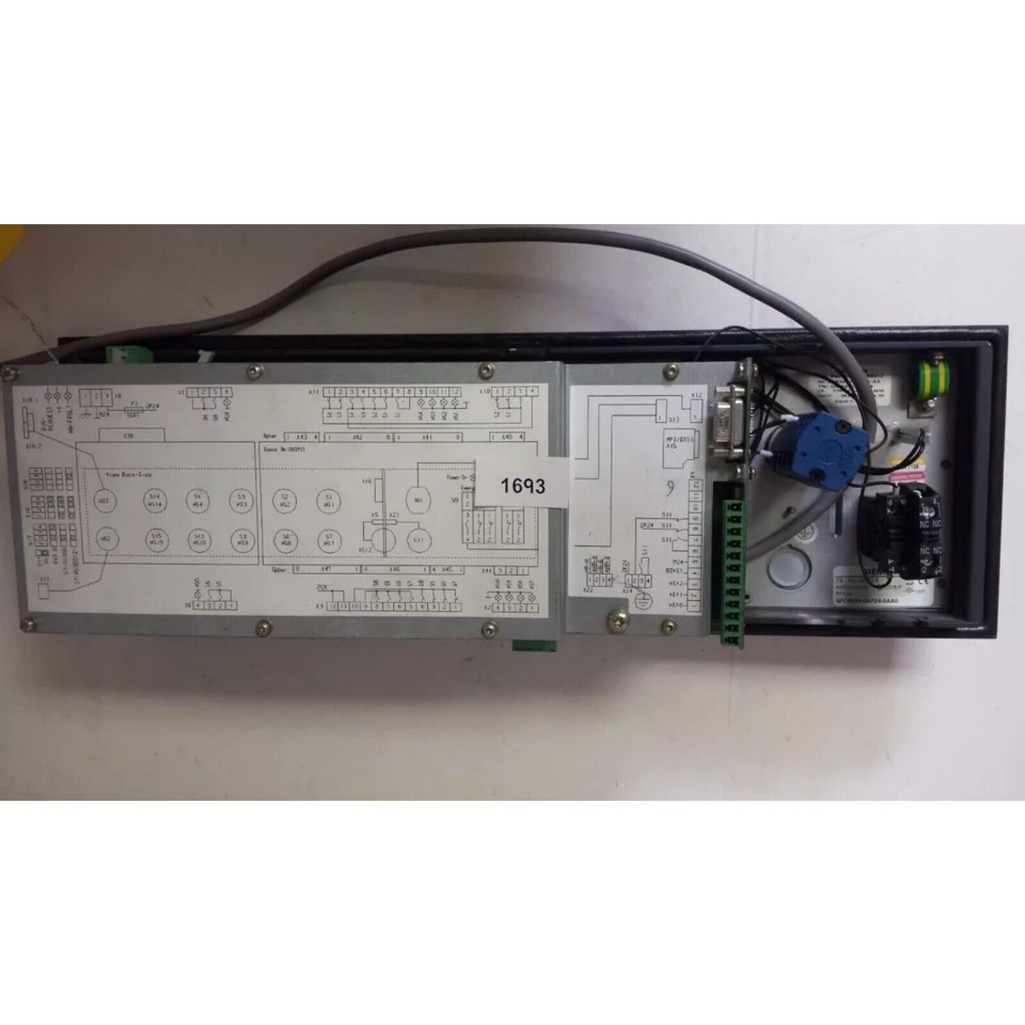 Siemens SINUMERIK operator panel with circuit diagrams and connectors.