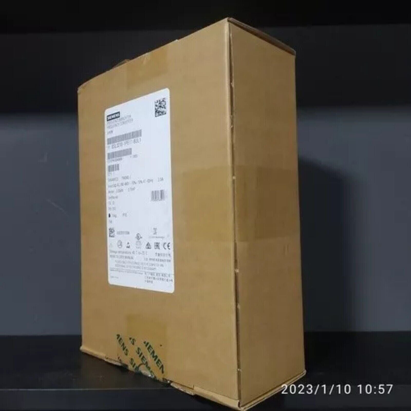 Siemens SINAMICS PM240-2 Power Module in packaging, industrial automation part, 6SL3210-1PE11-8UL1, product label visible.