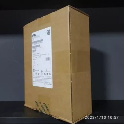 Siemens SINAMICS PM240-2 Power Module in packaging, industrial automation part, 6SL3210-1PE11-8UL1, product label visible.