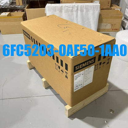 Siemens 6FC5203-0AF50-1AA0 SINUMERIK operator panel box, brown cardboard on wooden pallet, industrial automation part.