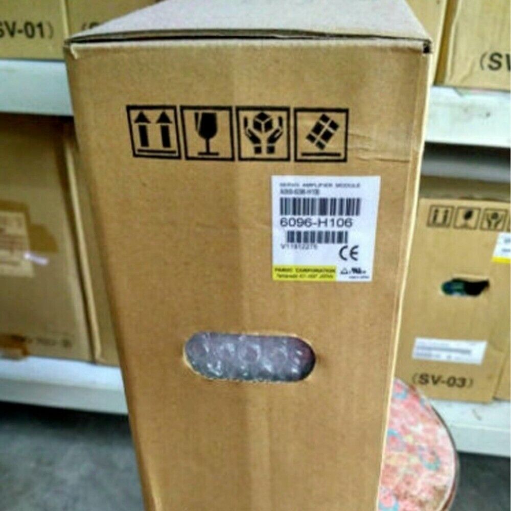 FANUC A06B-6096-H106 Servo Drive in cardboard box, product packaging for industrial automation parts.