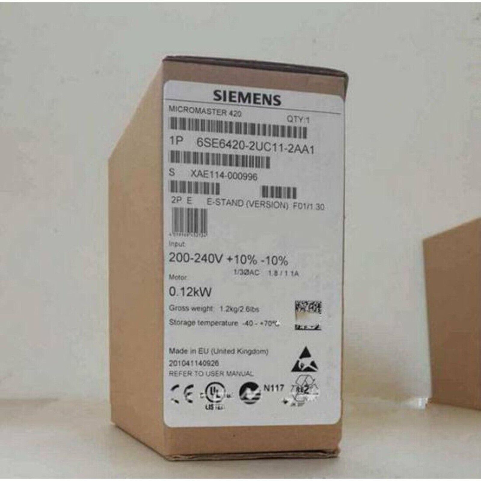 Siemens MICROMASTER 420 industrial automation drive, model 6SE6420-2UC11-2AA1 on brown cardboard box