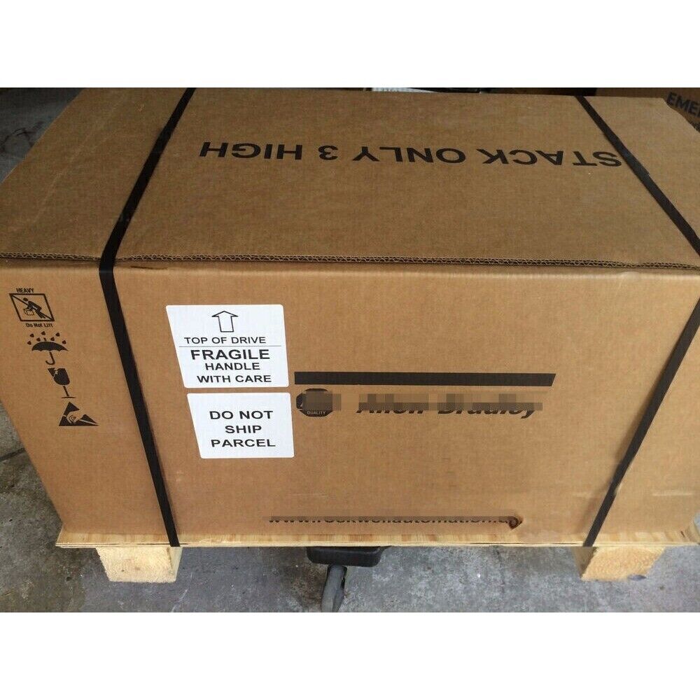 Allen-Bradley PanelView 1000 packaged for shipment, marked with fragile and handling instructions.