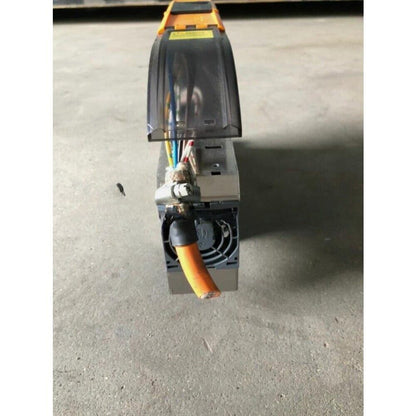 B&R 8BVI0028HCS0.000-1 servo drive. Automation part with protective cover, wires, and orange cable.  Servo motor component.