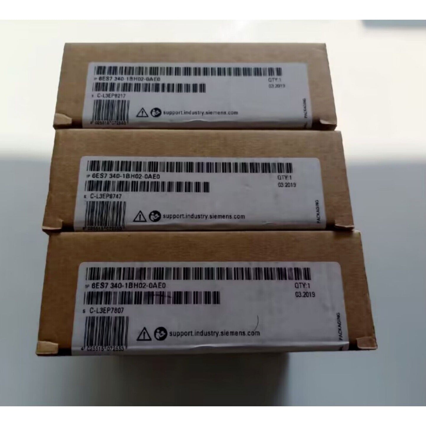Siemens SIMATIC S7-300 CP 340 PLC Module Boxes, product packaging with part number and barcode labels