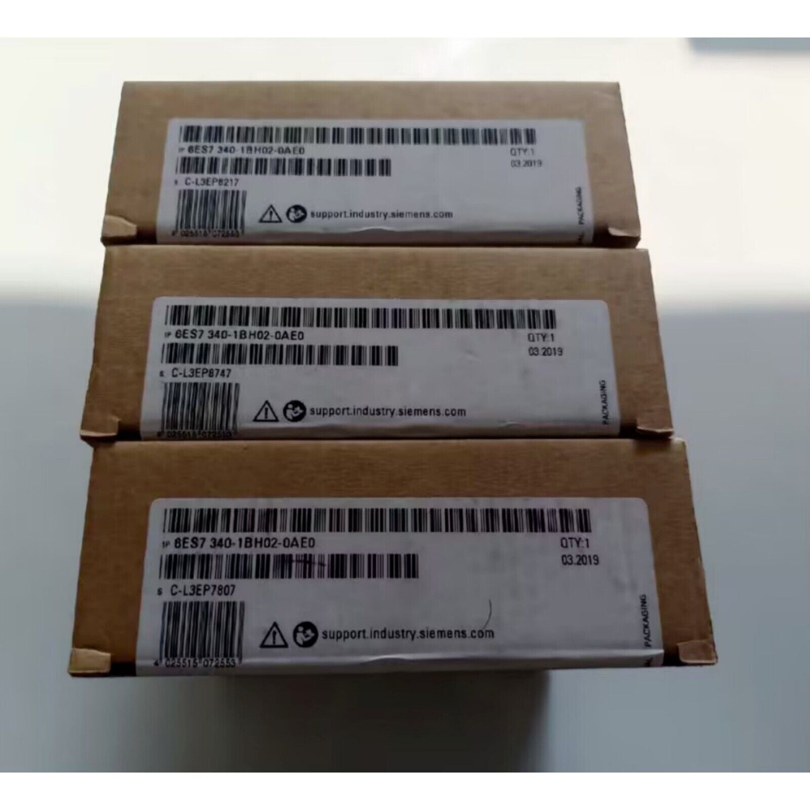 Siemens SIMATIC S7-300 CP 340 PLC Module Boxes, product packaging with part number and barcode labels