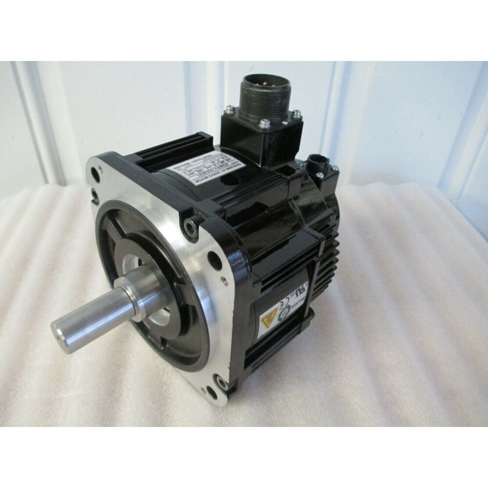 YASKAWA SGMGV-09A3A21 Servo Motor, black and silver industrial automation equipment, front view.