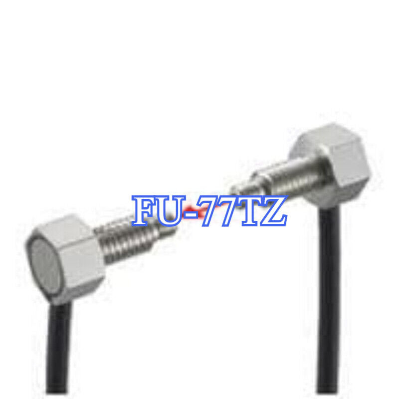 Keyence FU-77TZ transmissive fiber optic sensor unit, industrial automation part with cable and metal body.