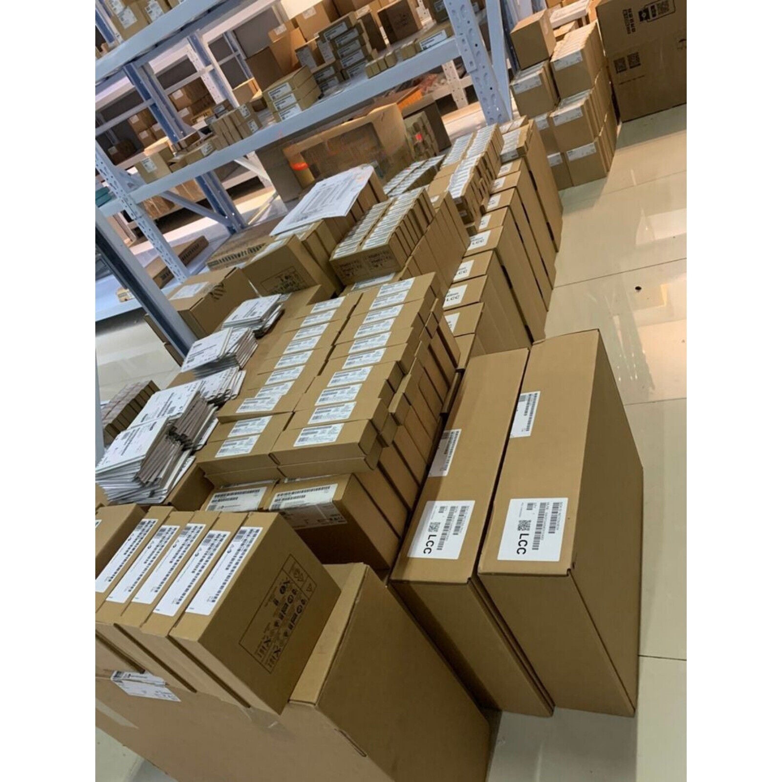 Siemens SINAMICS G120C Inverter boxes in warehouse, ready for shipment, industrial automation parts.