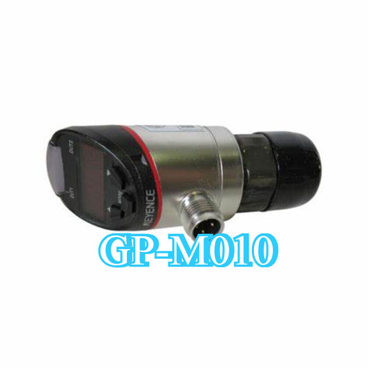 Keyence GP-M010 pressure sensor. Featuring a digital display and black and silver metal body. GP-M010 text is at the bottom.