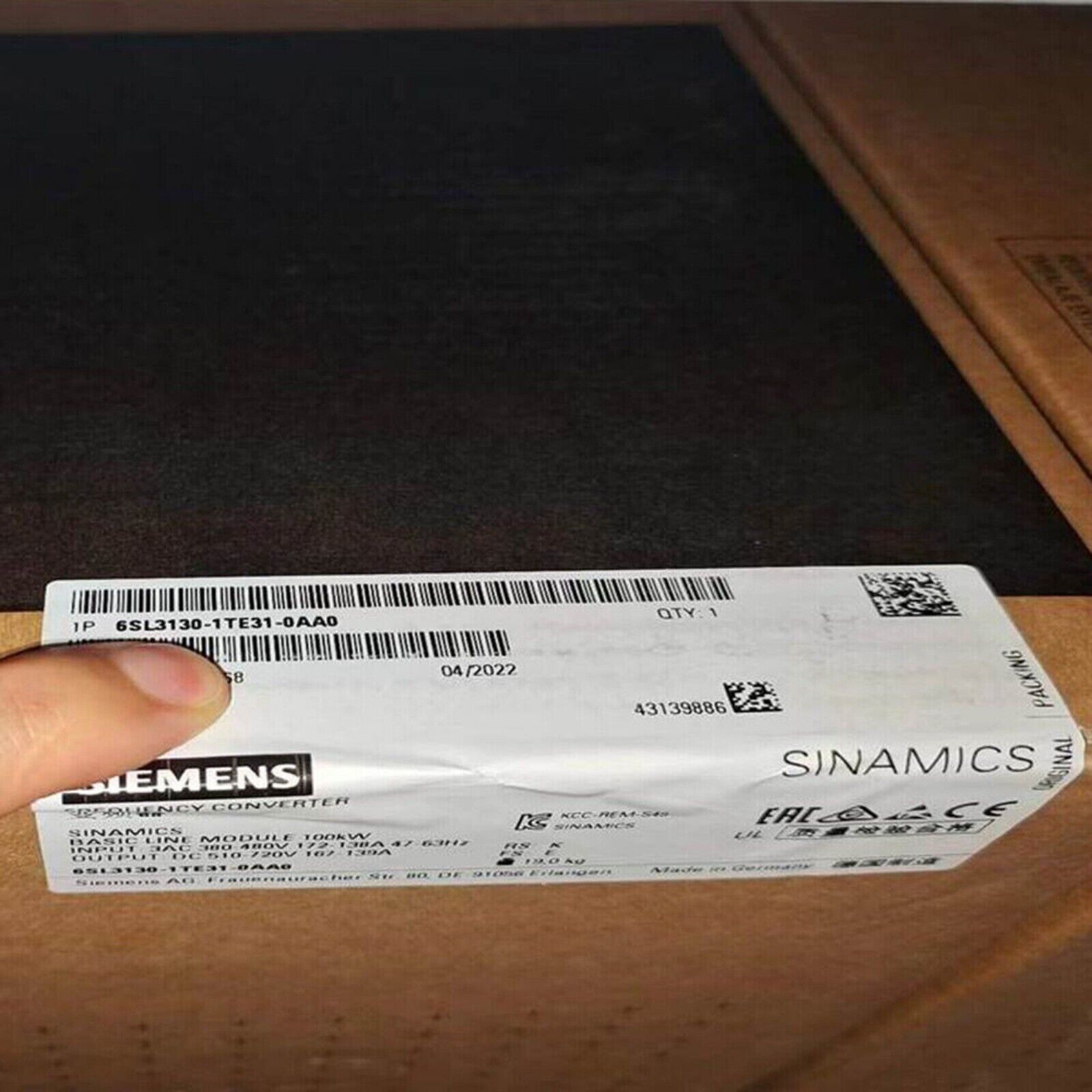 Siemens SINAMICS Basic Line Module 6SL3130-1TE31-0AA0 product packaging with details like 100kW converter, Made in Germany.