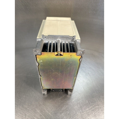 YASKAWA ServoPack SGDB-20ADG servo drive, beige, industrial automation equipment, cooling fins, made of metal.