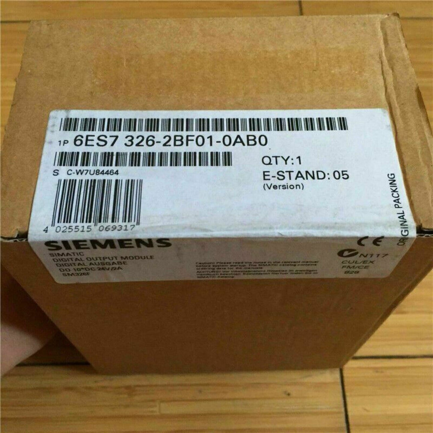 Siemens SIMATIC S7-300 digital output module 6ES7326-2BF01-0AB0 packaging. Industrial automation part for 24V DC control.