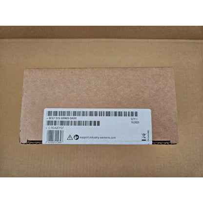 Siemens S7-1500 CPU in a cardboard box, model 6ES7 515-2AN03-0AB0, industrial automation part, packaging, with label.